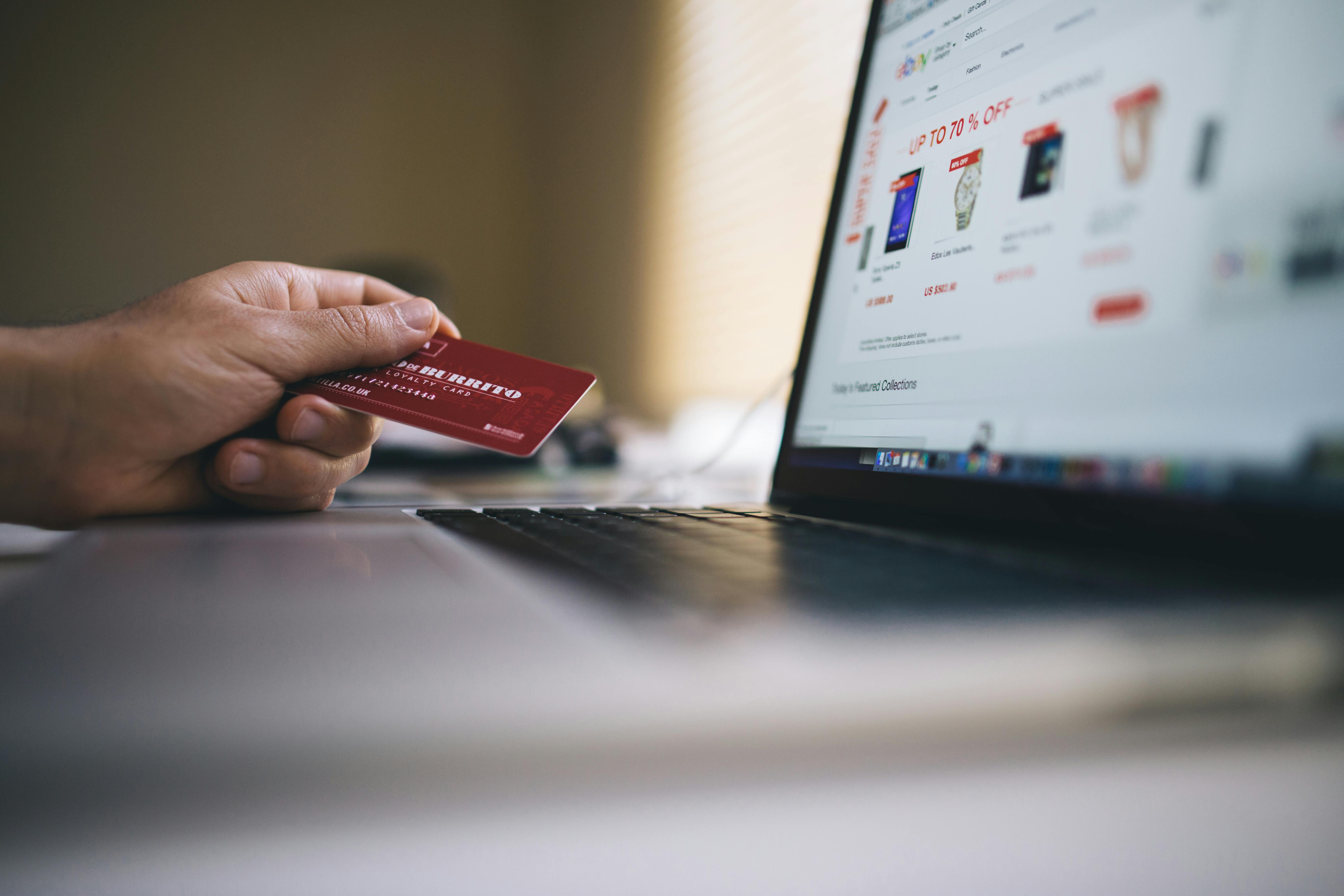 A Shopify cart drawer showing an upsell product, free shipping progress, and checkout summary